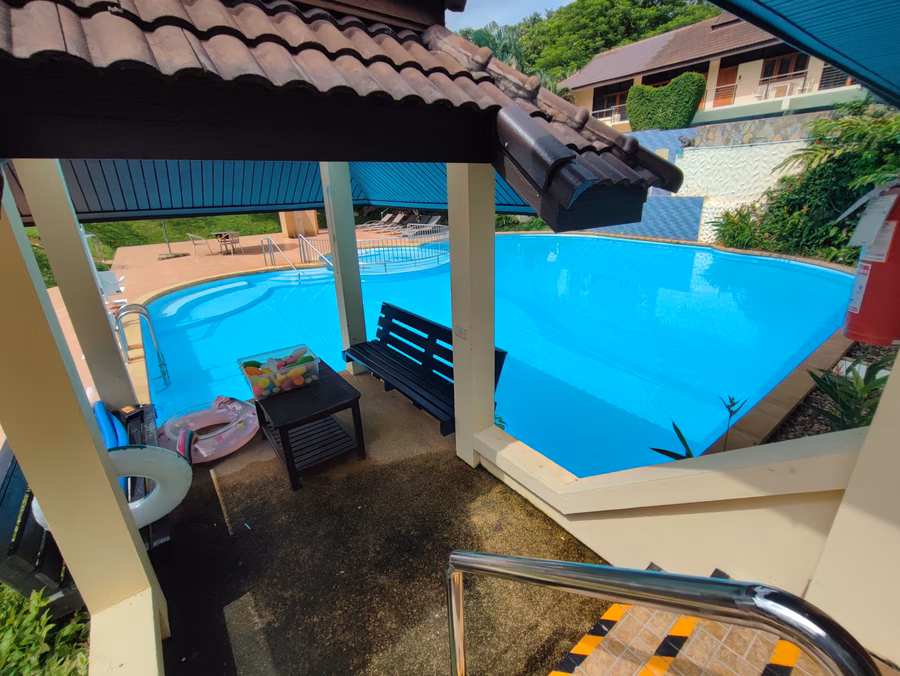 The covered terrace beside Pool 2.