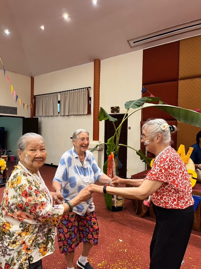 Residents exchanging Songkran blessings.