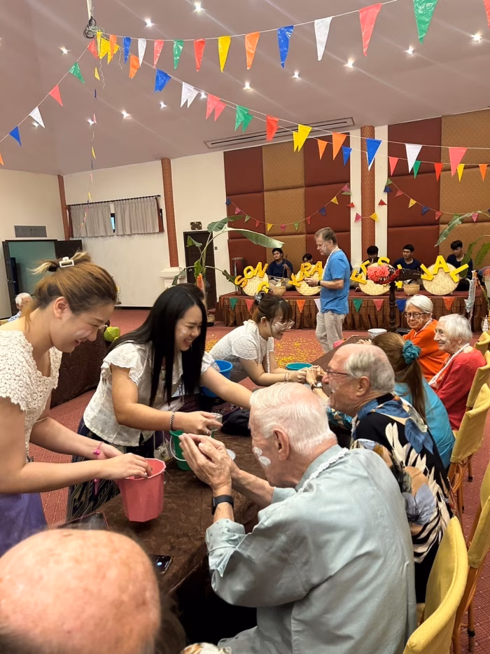 Residents and staff gathered for the Songkran festival.